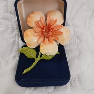 Elegant Floral Brooch with Orange Petals